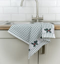Poli-Dri Holly jacquard tea towel with woven holly border