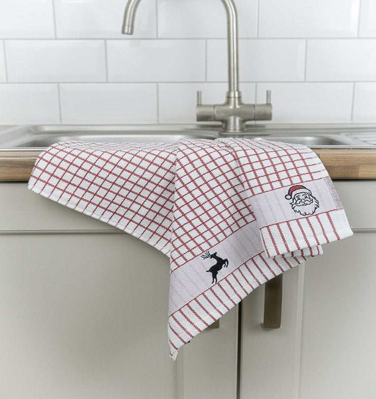 Poli-Dri Santa jacquard tea towel with woven Santa border